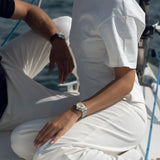 Raymond Weil Millesime Moonphase al polso donna su barca a vela, bracciale acciaio e quadrante dorato 2145-ST-10001