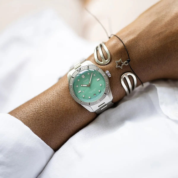 Orologio ORIS Divers Sixty-Five Cotton Candy quadrante verde bracciale in acciaio 01 733 7771 4057-07 8 19 18