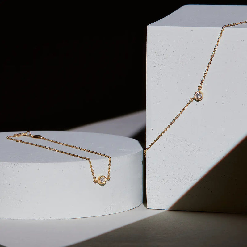 Geometrie di Luce Bracciale e Collana Punto Oro Giallo e Diamanti