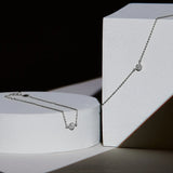 Geometrie di Luce Collana e Bracciale Punto Oro Bianco e Diamanti