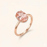 Alfyo anello solitario Alba con morganite centrale rosa pesca oval cut e hidden halo di diamanti con montatura in oro rosa 
