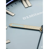 D1 Milano Polycarbon After Dark macro quadrante azzurro con lancette Dauphine e indici a bastoni in ottone luminosi PCBJ51