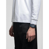 D1 Milano POLYCARBON Blue Legacy orologio blu indossato al polso, design sportivo con dettagli arancioni PCBJ41