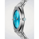 D1 Milano Ultra Thin Ice Sealed dettaglio laterale corona e quadrante azzurro con indici a bastoni in acciaio UCBU03