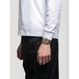 D1 Milano Ultra Thin Jade Mirage orologio indossato al polso, quadrante verde e bracciale champagne PVD UHBJ09