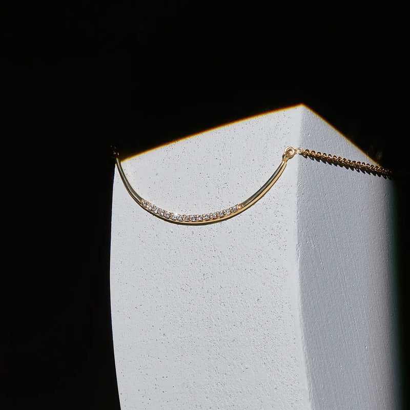 Geometrie di Luce Collana Arco Oro Giallo e Diamanti set