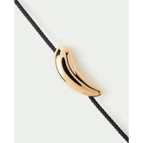 Pdpaola Bracciale Orbit Cord macro dettaglio elemento in argento placcato oro 18kt e cordino intrecciato nero PU01-937-U