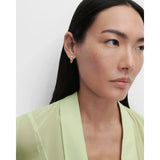 Pdpaola Orecchini Becca a cerchio dorati con zircone indossati, vista laterale su modella AR01-E02-U