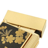 St Dupont Ligne 2 Maki-e dettaglio coperchio dorato guilloché e decorazione floreale Maki-e in lacca nera e oro C16151