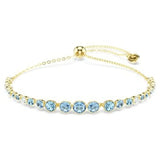 Swarovski Bracciale Imber Gradient cristalli azzurri taglio round con montatura color oro e chiusura scorrevole 5757824