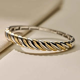 Ti Sento Bracciale Intrecciato dettaglio chiusura e bande intrecciate argento placcato oro giallo 18kt 23078SY/S