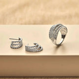 Ti Sento Orecchini Cerchio in argento con zirconi abbinati ad anello coordinato della stessa collezione 78069ZI