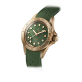 Yema Superman Bronze CMM.10 vista laterale cassa bronzo satinato lunetta girevole quadrante verde cinturino gomma 17.26.10.34.ZN.U4