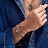 Zancan Bracciale Cosmopolitan Grumetta indossato su polso uomo, placca spinelli neri e catena argento EXB652
