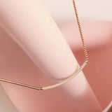 Collana a sferette Rosato in argento placcato oro rosa con barretta centrale in pavé di zirconi RZBI02 Ambientato