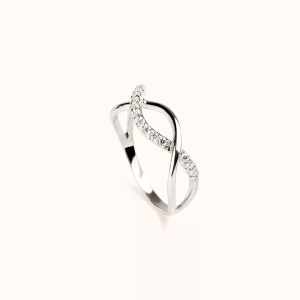 Anello ALFYO Infinity realizzato in oro bianco 18 carati con diamanti a forma di infinito laterale