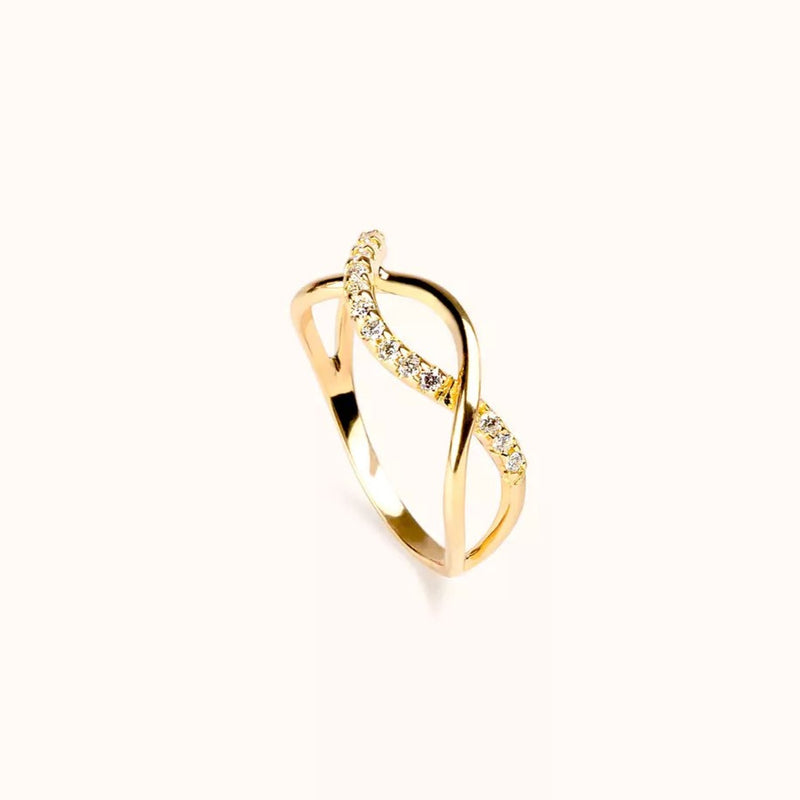 Anello ALFYO Infinity realizzato in oro giallo 18 carati con diamanti a forma di infinito laterale